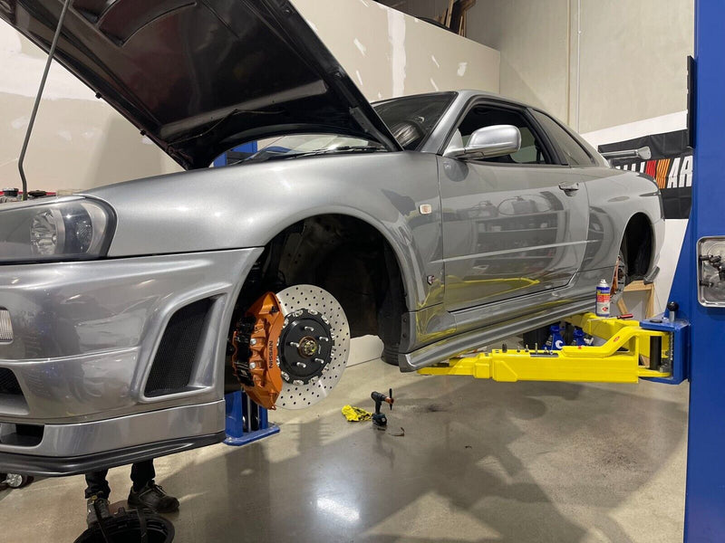 R35 GTR Brake Adapter Kit (V4) to Suit Skyline R32, R33, R34 – Cross Drilled Rotors